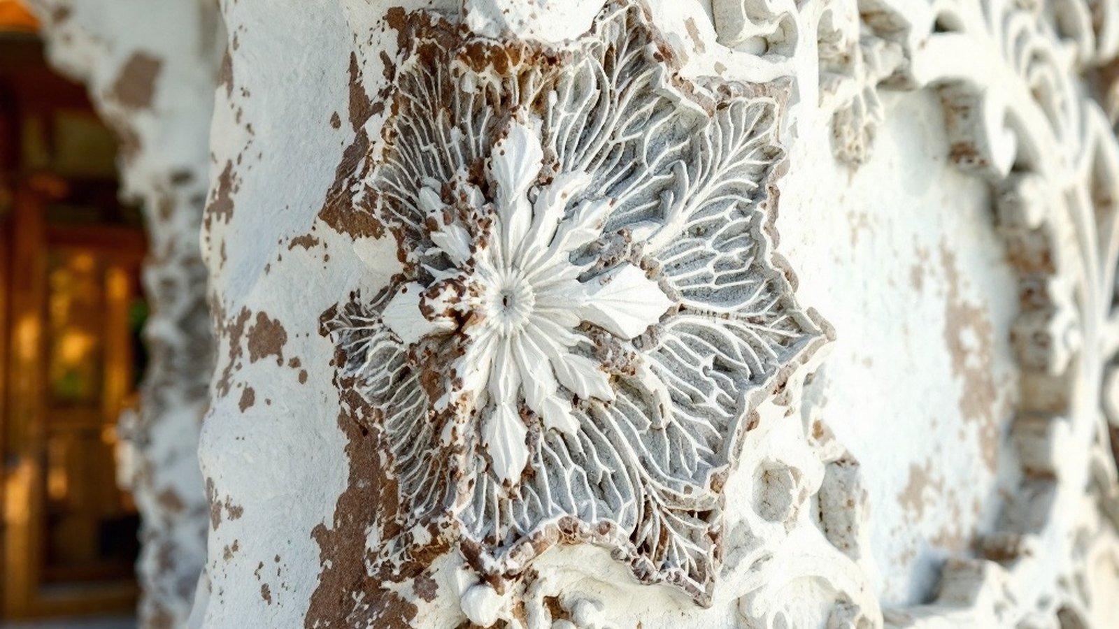 Close-up of coral-stone carving on Hukuru Miskiy's exterior walls