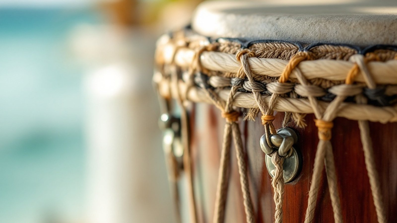 Close-up of a bodu beru drum body and lashed skin, natural light