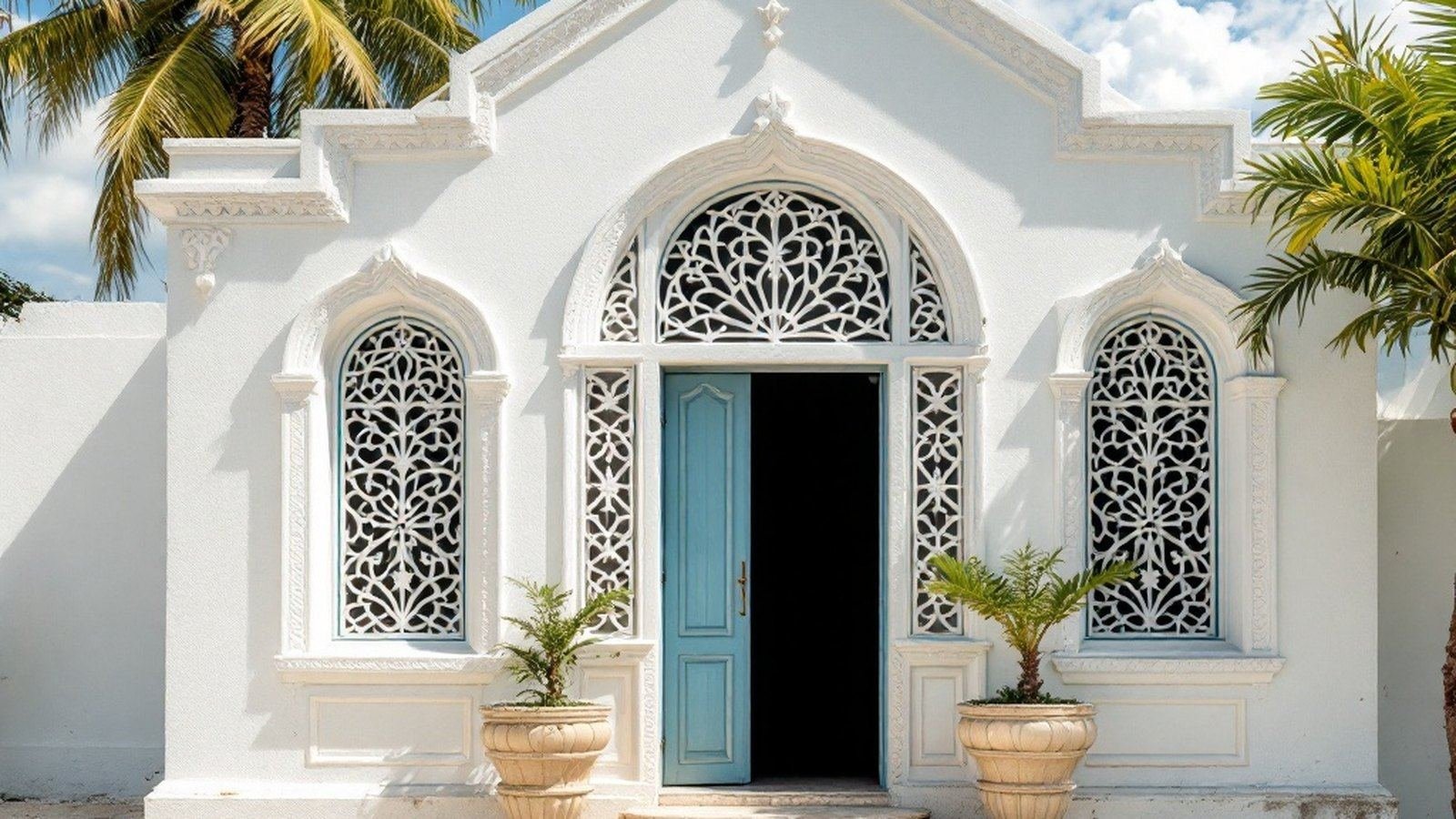 Hukuru Miskiy exterior, showing coral-stone carved panels